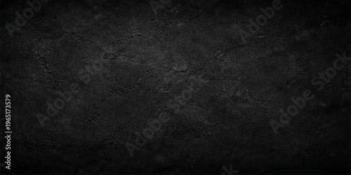 A dark grunge background featuring a weathered black and white texture with an aged stone pattern on a rough vintage concrete surface