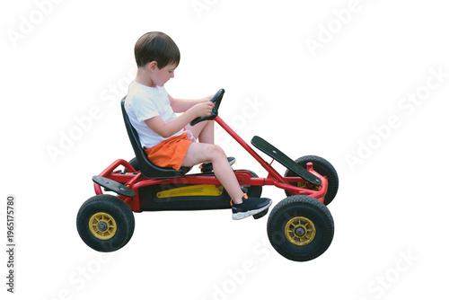 Obraz na plátne Little boy riding red pedal go-kart isolated on transparent background