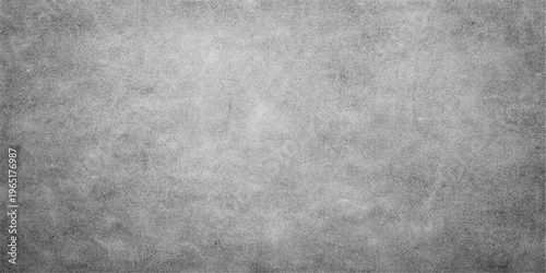 A dark gray brushed metal texture background with a vintage grunge pattern on an aged rough surface of black stone and dirty concrete