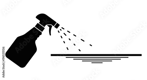 Cleaning spray bottle spraying liquid onto a surface, hygiene and disinfection concept
