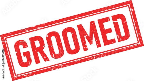 Distressed Red Rectangular Rubber Stamp Impression with the Text GROOMED Isolated