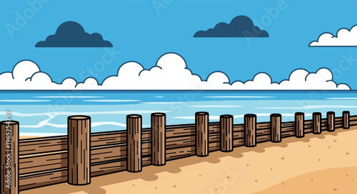 Wooden fence lines a sandy beach beside a calm blue ocean under a cloudy sky