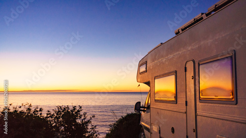 Принти на полотні Caravan on sea shore at sunrise.