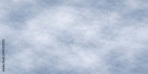 A brilliant sun illuminates fluffy white clouds floating across a vibrant blue summer sky within the clear atmosphere of a beautiful day