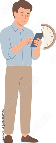 Man checks phone next to clock on wall indoors