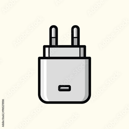 A cartoon-style illustration of an electronic device, featuring a rectangular body with two prongs on top and a horizontal slot