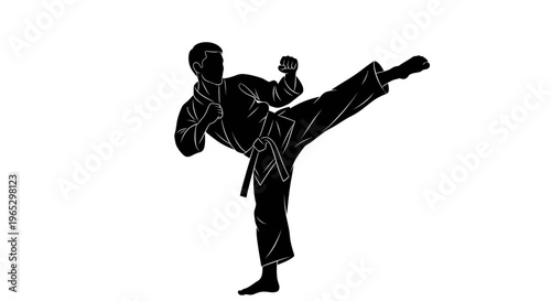 Man in karate uniform kicking high.