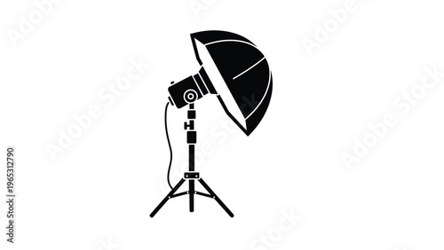 Professional photography studio lighting setup silhouette featuring a softbox on a tripod stand with an electrical cord.