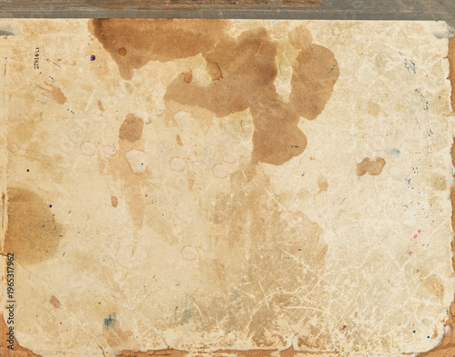 Old paper texture, heavy stains, dirt marks, scratches and worn edges creating grunge surface isolated as background, copy space. Natural vintage design, distressed backdrop, aged material