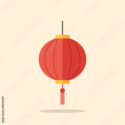 Vibrant red Chinese lantern with golden accents and tassel hanging