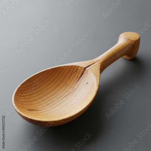 Handcrafted Artisan Wooden Scoop with Natural Grain Texture on Minimalist Dark Background, Elegant Kitchenware