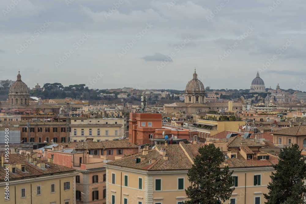 Obraz premium Rome skyline from Capitoline Hill with Italian pine trees and St Peter Basilica dome view