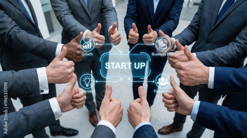 Business team giving thumbs up to startup concept with digital icons