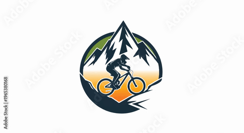 Silhouette of a cyclist riding down a mountain trail at sunset