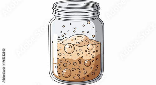 Glass jar with bubbling, frothy brown liquid and small bubbles