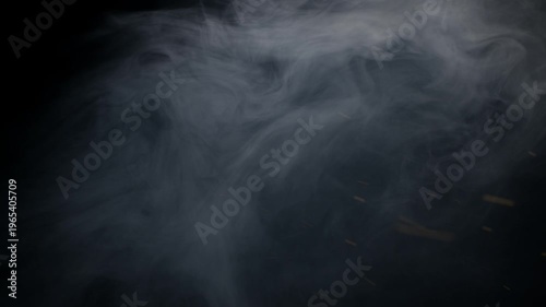 Abstract swirling smoke and embers drifting on a black background.