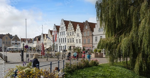 The Amsterdam or Dutch houses at a square at Town of Friedrichstadt, located in Schleswig-Holstein, Germany, is a charming town known for its unique history and notable architecture.