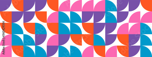 Geometric pattern with colorful quarter circles and squares in a repeating grid