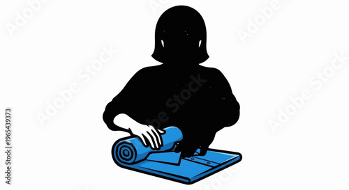 Silhouette of a person folding blue fabric, possibly a shirt or towel