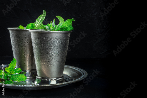 Mint Julep in the Kentucky Derby classic silver glass, with fresh mint leaves