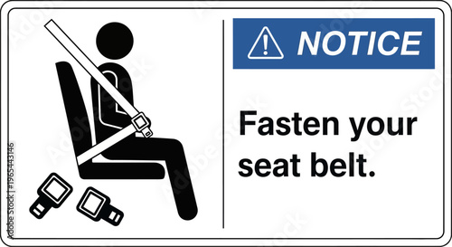 A sign displays a person wearing a seatbelt with a notice to fasten your seat belt.