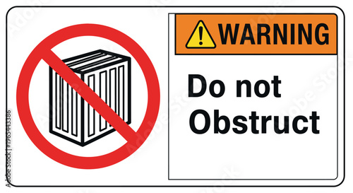 A warning sign displays a prohibited obstruction symbol with an industrial object.