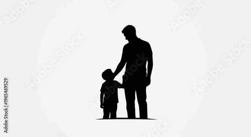 A father's hand rests on his son's shoulder in a silhouette
