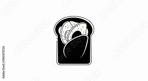 Sliced avocado on toast with black background and gold flecks