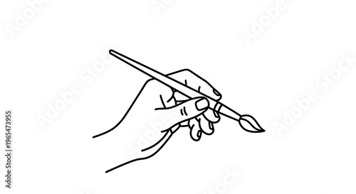 Hand holding a paint brush tightly.