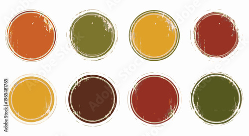 Eight distressed circular stamps in autumnal colors on a white background