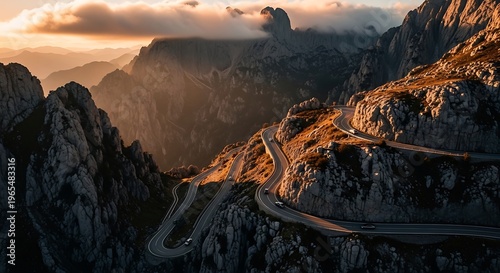 Breathtaking winding mountain road at golden hour, warm light casting shadows over rugged peaks, a scenic journey through a majestic alpine landscape