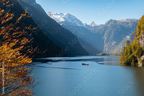 Königssee lake in Berchtesgaden National Park, Germany with boat and alpine mountain landscape