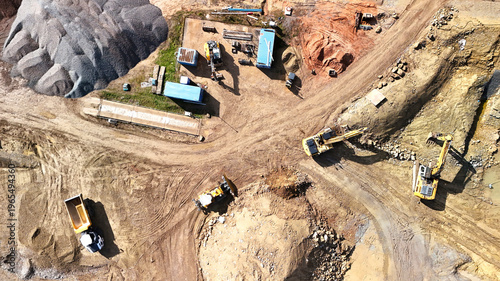 Aerial View of Construction Site with Excavators and Heavy Machinery