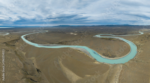 Aerial view over the endless Patagonian pampas with meandering river, southern Argentina