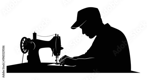 Man working on sewing machine.