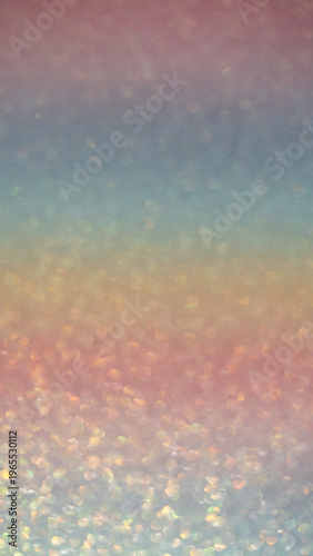 Abstract gradient background with soft bokeh effect in pastel colors of pink, blue, and yellow