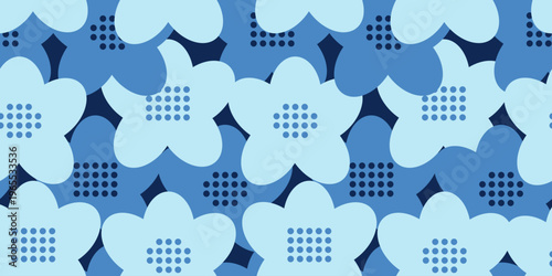 Seamless vector floral pattern with bold geometric flowers and dotted accents in blue tones. Modern abstract design with light and dark blue shapes, perfect for textiles, wallpapers, and prints