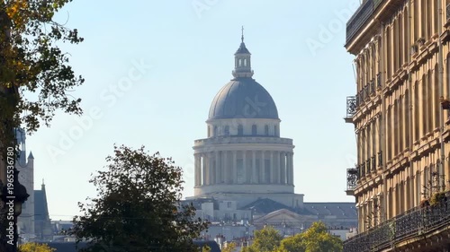 Zoomed view of the Panthéon dome rising above the traditional Haussmann buildings of the 5th arrondissement in Paris, France