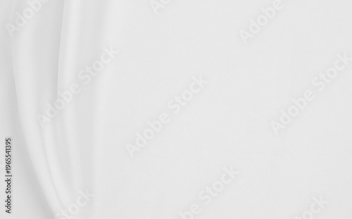 Smooth elegant white silk or satin luxury cloth texture as wedding background. Luxurious background design