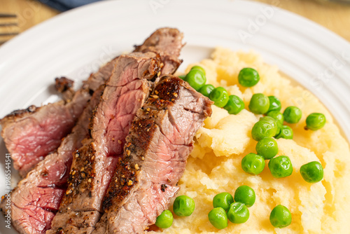 Obraz na plátně Steak and potatoes. Red meat dinner with prime sirloin beef.