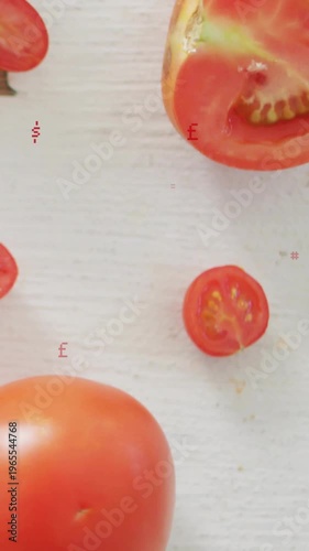 Vertical video: Tomato trio revealing while camera rising and zooming glyphs flashing to show seeds