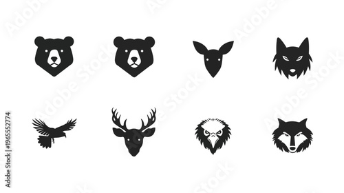 Set of diverse wild animal head silhouettes: bear, deer, wolf, and eagle icons for modern logo design and branding projects