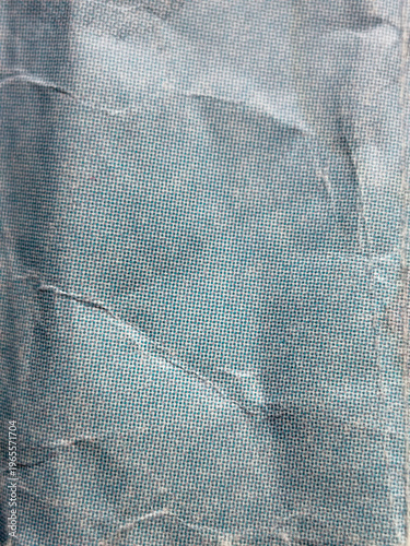 Textura de papel azul desgastado con múltiples pliegues y superficie granulada envejecida