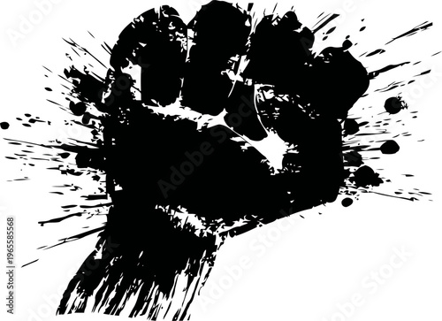 Black ink clenched fist with splatter effect strong power symbol of resistance and determination