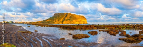 Seongsan Ilchulbong Sunrise Peak at Golden Sunrise from Gwangchigi Beach, Jeju Island, South Korea