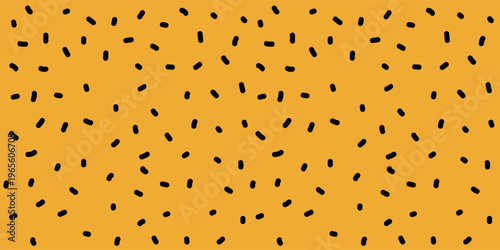 Seamless pattern with organic black dashes on trendy mustard yellow background