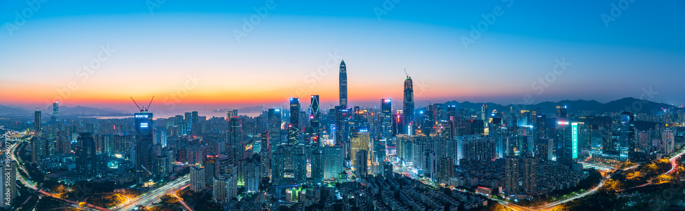 Fototapeta premium The skyline of Futian District, Shenzhen at dusk