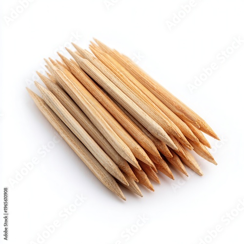 Wooden toothpicks bundle on white background, sharp pointed picks, natural wood texture for hygiene and food garnish