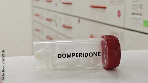 DOMPERIDONE tablets used to treat nausea and improve gastric motility a dopamine antagonist in plastic box