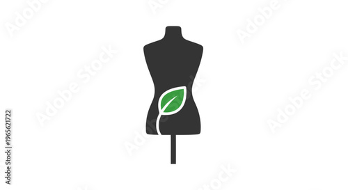 Black dress form with green leaf.